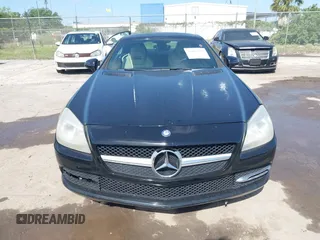 2013 Mercedes-Benz SLK-Class SLK 250 with VIN WDDPK4HA5DF059891, listed as a IAAI auction lot 42015777 with 79,255 mi miles. Bid and sale history available at carsss.com. Image 6.