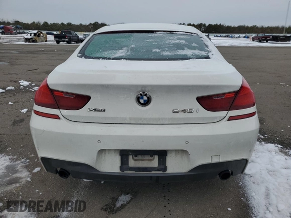 2015 BMW 6 Series 640i xDrive z VIN WBA6B8C55FD452972, wystawiony jako Copart lot #44559495 z przebiegiem 114 358 mil mil oraz Szkoda całkowita • Salvage title. Historia ofert i sprzedaży dostępna na DreamBid. Obrazek 6.