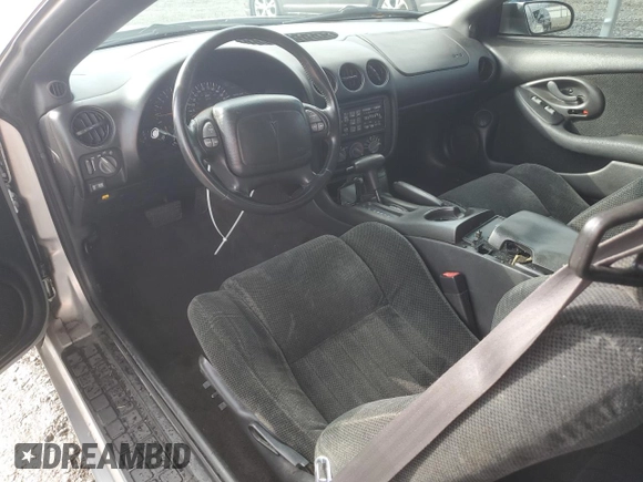 2002 Pontiac Firebird Firebird z VIN 2G2FS22K122146573, wystawiony jako Copart lot #84674224 z przebiegiem 156 932 mil mil oraz Szkoda całkowita • Salvage title. Historia ofert i sprzedaży dostępna na DreamBid. Obrazek 8.