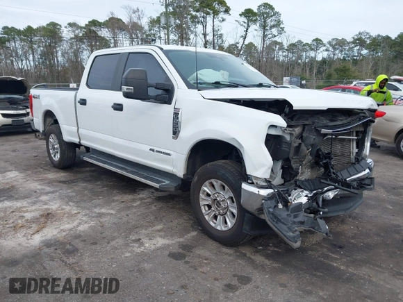 2022 Ford F-250 XL z VIN 1FT7W2BTXNEF76074, wystawiony jako IAAI lot #41339363 z przebiegiem 70 594 mil mil oraz . Historia ofert i sprzedaży dostępna na DreamBid. Obrazek 1.