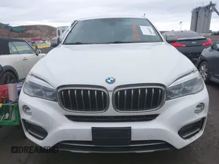 2015 BMW X6 xDrive35i with VIN 5UXKU2C57F0N77194, listed as a IAAI auction lot 41818860 with 105,579 mi miles and . Bid and sale history available at DreamBid. Image 12.