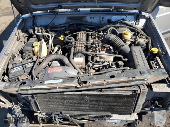 2000 Jeep Cherokee z VIN 1J4FF48S0YL142309, wystawiony jako Copart lot #46277785 z przebiegiem 148 966 mil mil oraz Nie do naprawy • Non repairable. Historia ofert i sprzedaży dostępna na DreamBid. Obrazek 11.