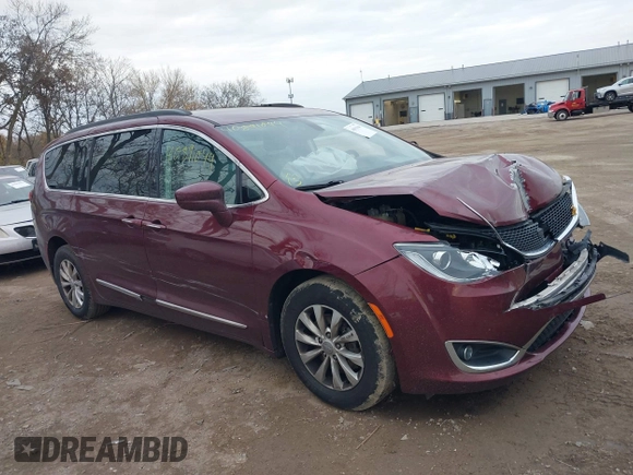 2017 Chrysler Pacifica Touring L z VIN 2C4RC1BG2HR535119, wystawiony jako IAAI lot #40891044 z przebiegiem 172 664 mil mil oraz . Historia ofert i sprzedaży dostępna na DreamBid. Obrazek 1.