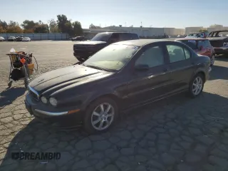 2004 Jaguar X-Type z VIN SAJEB52D94XD67350, wystawiony jako Copart lot #80131904 z przebiegiem 116 329 mil mil oraz Czysty tytuł • Clean title. Historia ofert i sprzedaży dostępna na DreamBid. Obrazek 1.