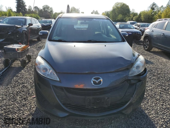 2014 Mazda 5 Sport с VIN JM1CW2BL2E0167630, выставлен на аукционе Copart как лот 54394195 с пробегом 79 034 миль миль и Списание • Salvage title. История ставок и продаж доступна на DreamBid. Изображение 5.