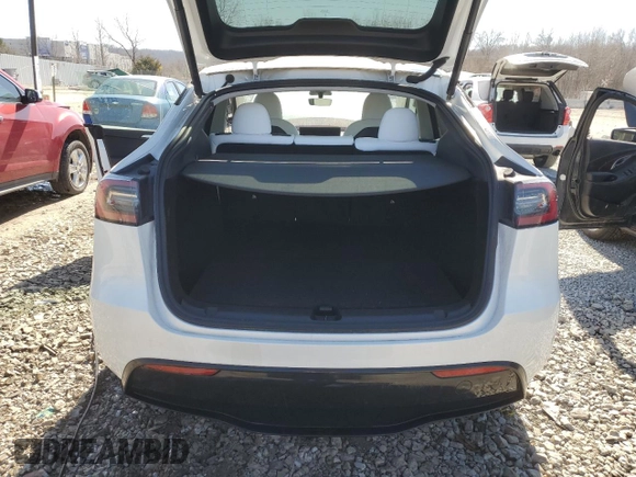 2023 Tesla Model Y Long Range with VIN 7SAYGDEE5PF691745, listed as a Copart auction lot 47784545 with 21,117 mi miles and Salvage Title. Bid and sale history available at DreamBid. Image 6.