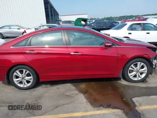 2012 Hyundai Sonata Limited z VIN 5NPEC4AC8CH425163, wystawiony jako IAAI lot #42297206 z przebiegiem 159 946 mil mil oraz . Historia ofert i sprzedaży dostępna na DreamBid. Obrazek 13.