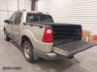 2004 Ford Explorer Sport Trac XLS with VIN 1FMZU77KX4UA39054, listed as a IAAI auction lot 41604708 with 256,789 mi miles. Bid and sale history available at carsss.com. Image 3.