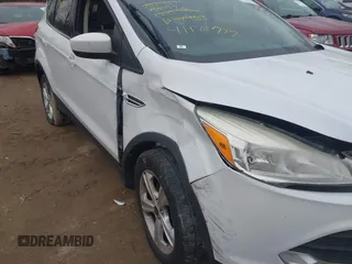 2014 Ford Escape SE with VIN 1FMCU9G93EUD37963, listed as a IAAI auction lot 41178797 with 171,149 mi miles and . Bid and sale history available at DreamBid. Image 6.