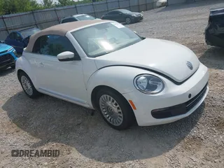2013 Volkswagen Beetle 2.5L with VIN 3VW5X7AT5DM817483, listed as a IAAI auction lot 42493192 with 74,180 mi miles and . Bid and sale history available at DreamBid. Image 1.