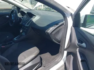 2013 Ford Focus SE z VIN 1FADP3F25DL290446, wystawiony jako IAAI lot #42520571 z przebiegiem 158 020 mil mil oraz . Historia ofert i sprzedaży dostępna na DreamBid. Obrazek 5.