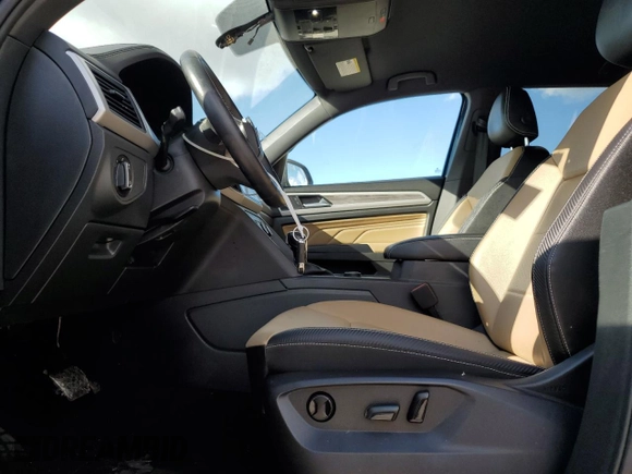2021 Volkswagen Atlas SE with VIN 1V2HE2CAXMC204778, listed as a Copart auction lot 74906404 with 53,597 mi miles and Salvage title. Bid and sale history available at DreamBid. Image 7.