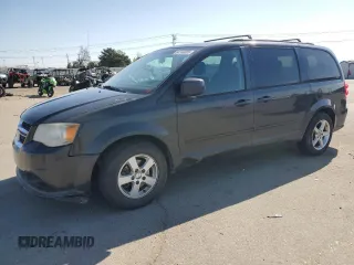 2012 Dodge Grand Caravan SXT with VIN 2C4RDGCG8CR204035, listed as a Copart auction lot 54743005 with 187,533 mi miles and Clean Title. Bid and sale history available at DreamBid. Image 1.