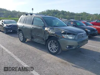 2009 Toyota Highlander Hybrid Limited with VIN JTEEW44A792032987, listed as a IAAI auction lot 42060184 with 258,761 mi miles. Bid and sale history available at carsss.com. Image 1.