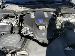 2015 Maserati Ghibli S Q4 with VIN ZAM57RTA8F1154318, listed as a IAAI auction lot 41713821 with 71,433 mi miles. Bid and sale history available at carsss.com. Image 10.