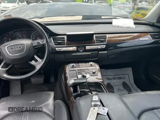 2012 Audi A8 z VIN WAURVAFD6CN015907, wystawiony jako Copart lot #59188515 z przebiegiem 112 879 mil mil oraz Czysty tytuł • Clean title. Historia ofert i sprzedaży dostępna na DreamBid. Obrazek 9.