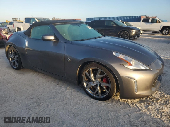 2014 Nissan 370Z Touring with VIN JN1AZ4FH4EM620092, listed as a Copart auction lot 77439254 with 38,662 mi miles and Salvage Title. Bid and sale history available at DreamBid. Image 4.