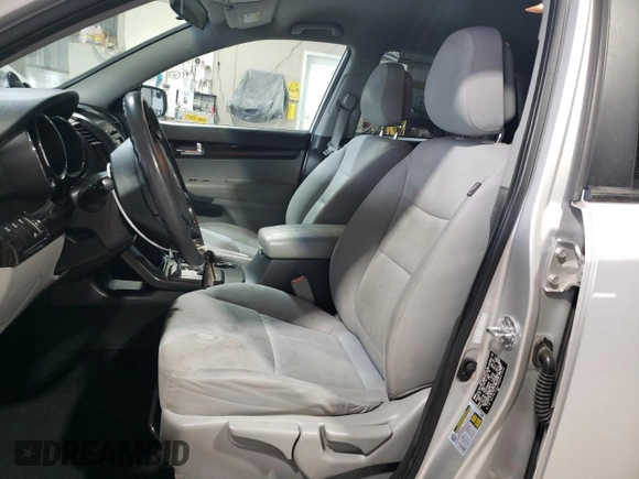 2011 Kia Sorento LX with VIN 5XYKT4A2XBG047542, listed as a Copart auction lot 50230175 with 176,881 mi miles and Salvage Title. Bid and sale history available at DreamBid. Image 7.