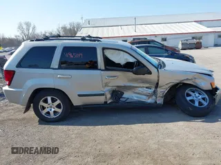 2008 Jeep Grand Cherokee Laredo with VIN 1J8GR48K28C169859, listed as a IAAI auction lot 41965149 with 166,069 mi miles. Bid and sale history available at carsss.com. Image 13.