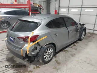 2015 Mazda 3 i Touring with VIN 3MZBM1L73FM214740, listed as a IAAI auction lot 41402534 with 83,436 mi miles and . Bid and sale history available at carsss.com. Image 4.