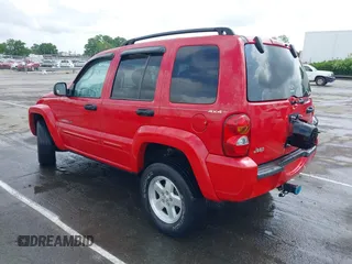 2002 Jeep Liberty Limited z VIN 1J8GL58K42W262492, wystawiony jako IAAI lot #42121270 z przebiegiem 167 662 mil mil oraz . Historia ofert i sprzedaży dostępna na DreamBid. Obrazek 3.