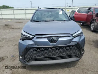 2024 Toyota Corolla Cross Hybrid S with VIN 7MUFBABG0RV053138, listed as a Copart auction lot 59515915 with 7,065 mi miles and Salvage title. Bid and sale history available at DreamBid. Image 5.