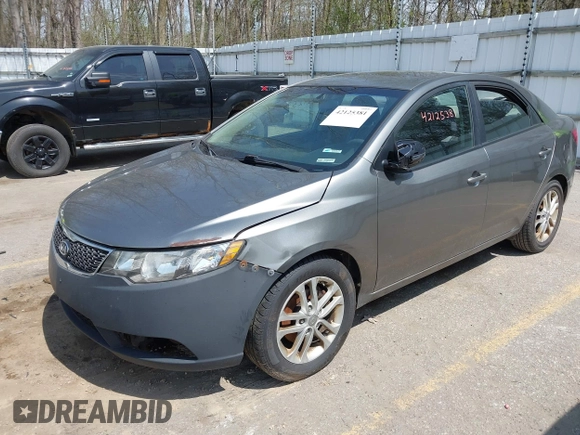 2011 Kia Forte EX with VIN KNAFU4A22B5405396, listed as a IAAI auction lot 42125381 with 209,300 mi miles. Bid and sale history available at carsss.com. Image 2.