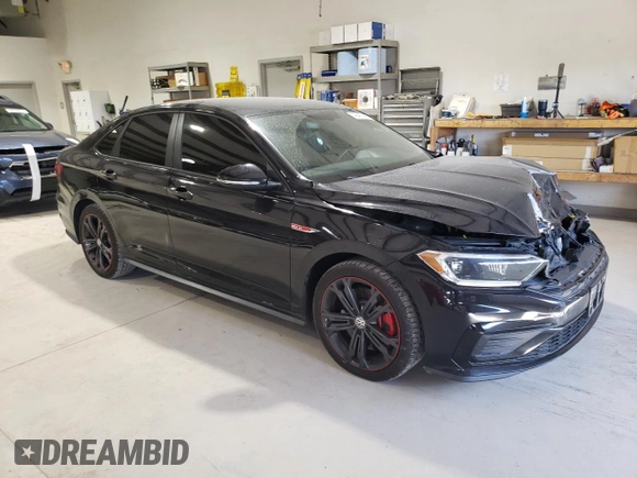2019 Volkswagen Jetta GLI S z VIN 3VW5T7BU9KM142852, wystawiony jako Copart lot #49419395 z przebiegiem 99 203 mil mil oraz Szkody całkowita. Historia ofert i sprzedaży dostępna na DreamBid. Obrazek 4.