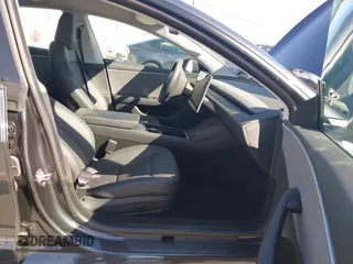 2024 Tesla Model 3 with VIN 5YJ3E1EA7RF717855, listed as a IAAI auction lot 41838814 with 8,750 mi miles and . Bid and sale history available at DreamBid. Image 5.