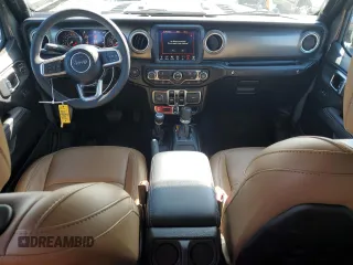 2023 Jeep Gladiator Rubicon with VIN 1C6JJTBG8PL550219, listed as a Copart auction lot 54627685 with 9,671 mi miles and Salvage title. Bid and sale history available at DreamBid. Image 8.