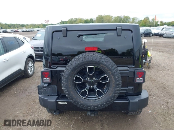 2018 Jeep Wrangler JK Unlimited Altitude with VIN 1C4BJWEG7JL881133, listed as a IAAI auction lot 40404302 with 95,726 mi miles. Bid and sale history available at carsss.com. Image 16.