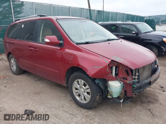 2012 Kia Sedona LX with VIN KNDMG4C75C6422392, listed as a IAAI auction lot 41235462 with 211,653 mi miles. Bid and sale history available at carsss.com. Image 1.