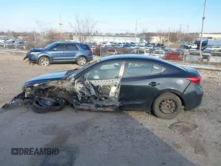 2015 Mazda 3 i SV with VIN JM1BM1T74F1246158, listed as a IAAI auction lot 41587923 with 147,001 mi miles. Bid and sale history available at carsss.com. Image 15.