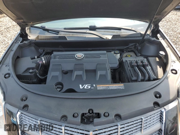 2011 Cadillac SRX Premium Collection z VIN 3GYFNFEY9BS606335, wystawiony jako Copart lot #59009285 z przebiegiem 152 828 mil mil oraz Szkoda całkowita • Salvage title. Historia ofert i sprzedaży dostępna na DreamBid. Obrazek 12.