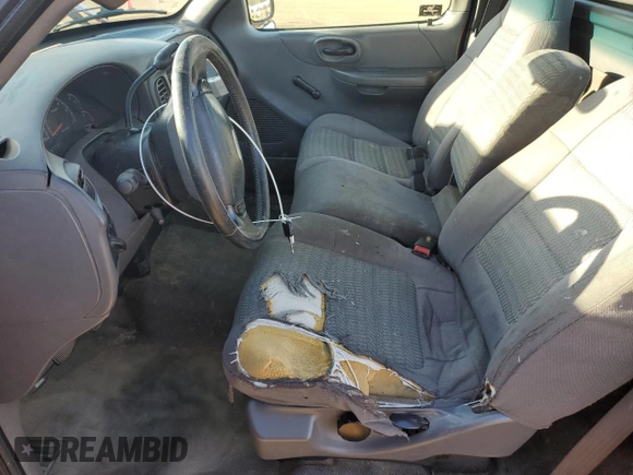 2003 Ford F-150 XL with VIN 1FTRF17283NA77788, listed as a Copart auction lot 49594385 with 333,522 mi miles and Salvage Title. Bid and sale history available at DreamBid. Image 7.