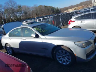 2014 BMW 7 Series 740i with VIN WBAYA6C54ED144450, listed as a IAAI auction lot 41680060 with 999,999 mi miles. Bid and sale history available at carsss.com. Image 12.