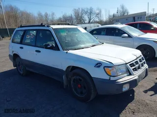 1999 Subaru Forester L with VIN JF1SF6355XH741974, listed as a IAAI auction lot 41973316 with 215,779 mi miles. Bid and sale history available at carsss.com. Image 1.