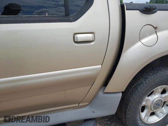 2002 Ford Explorer Sport Trac Value z VIN 1FMZU67E42UB44397, wystawiony jako IAAI lot #42727360 z przebiegiem 214 265 mil mil oraz . Historia ofert i sprzedaży dostępna na DreamBid. Obrazek 6.