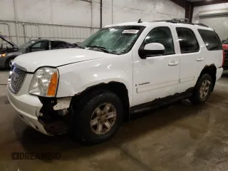 2009 GMC Yukon SLT w/4SB with VIN 1GKFK33099R252828, listed as a Copart auction lot 43205945 with 301,544 mi miles and Salvage Title. Bid and sale history available at carsss.com. Image 1.