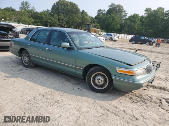 1997 Mercury Grand Marquis GS z VIN 2MELM74W2VX663313, wystawiony jako Copart lot #59539665 z przebiegiem 260 024 mil mil oraz Czysty tytuł • Clean title. Historia ofert i sprzedaży dostępna na DreamBid. Obrazek 4.