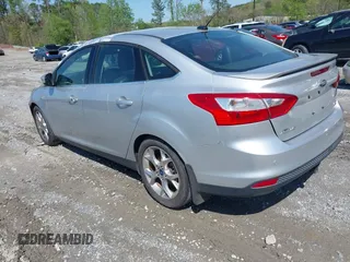 2014 Ford Focus Titanium with VIN 1FADP3J27EL227261, listed as a IAAI auction lot 41972536 with 172,470 mi miles. Bid and sale history available at carsss.com. Image 3.