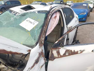2014 Honda Accord EX-L with VIN 1HGCR2F89EA075147, listed as a IAAI auction lot 40750671 with 117,000 mi miles and . Bid and sale history available at carsss.com. Image 6.