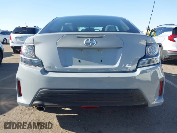 2015 Scion tC with VIN JTKJF5C7XFJ012872, listed as a IAAI auction lot 42128621 with 100,832 mi miles. Bid and sale history available at carsss.com. Image 17.