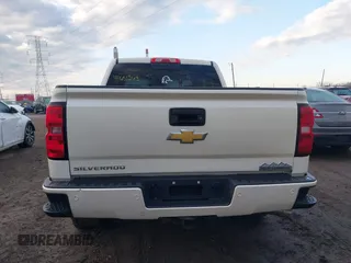 2014 Chevrolet Silverado 1500 High Country with VIN 3GCUKTEC5EG407573, listed as a IAAI auction lot 41651363 with 136,239 mi miles. Bid and sale history available at carsss.com. Image 16.