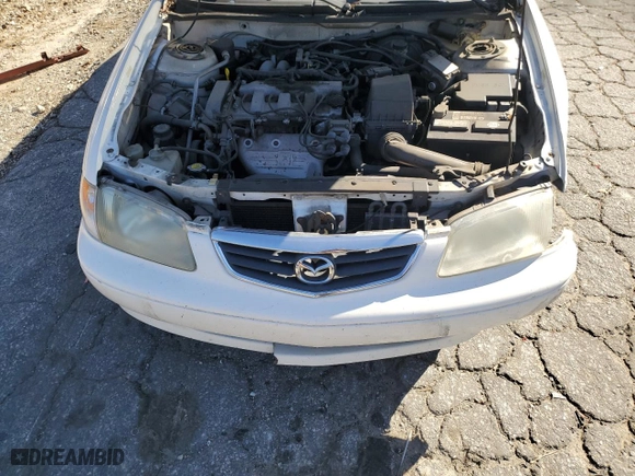 2001 Mazda 626 LX with VIN 1YVGF22C815240640, listed as a Copart auction lot 47609315 with 0 mi miles and Salvage Title. Bid and sale history available at carsss.com. Image 11.