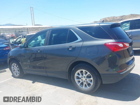 2021 Chevrolet Equinox LT z VIN 2GNAXKEV1M6165950, wystawiony jako IAAI lot #42221591 z przebiegiem Nie podano mil oraz . Historia ofert i sprzedaży dostępna na DreamBid. Obrazek 14.