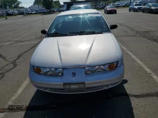 2000 Saturn SL z VIN 1G8ZK5279YZ252761, wystawiony jako Copart lot #63204475 z przebiegiem 80 646 mil mil oraz Czysty tytuł • Clean title. Historia ofert i sprzedaży dostępna na DreamBid. Obrazek 5.