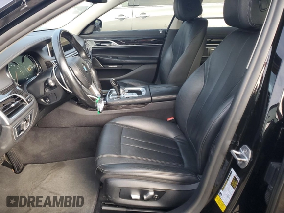 2018 BMW 7 Series 740i with VIN WBA7E2C58JG743269, listed as a Copart auction lot 84905044 with 74,951 mi miles and Salvage Title. Bid and sale history available at carsss.com. Image 7.