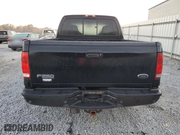 2003 Ford Super Duty F-250 XL with VIN 1FTNW20P53ED24629, listed as a Copart auction lot 77359574 with 311,737 mi miles and Salvage Title. Bid and sale history available at carsss.com. Image 6.