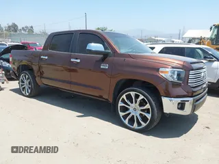 2014 Toyota Tundra 1794 Edition with VIN 5TFGY5F12EX173215, listed as a IAAI auction lot 42636108 with 126,835 mi miles and . Bid and sale history available at DreamBid. Image 1.